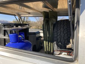 camping equipment inside doublecab canopy