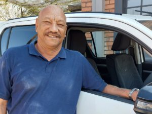 Dennis Scholtz infront of one of Kalahari Car Hire's rental cars in Windhoek Namibia