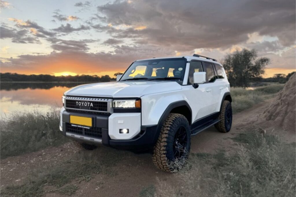 Toyota Landcruiser Prado Luxury SUV 4x4 automatic rental car in Namibian landscape
