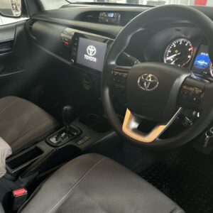 Interior of Toyota Hilux 2.4 4x4 Rental Car from driver side