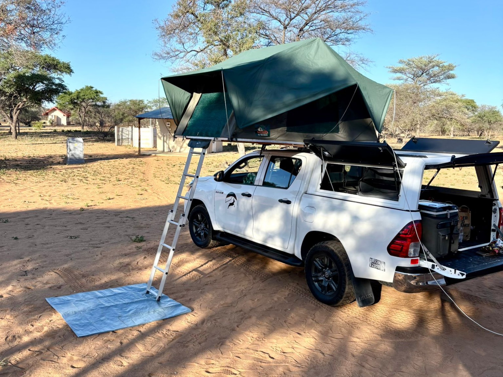 Toyota Hilux 4x4  rental Camping car with normal rooftent open